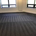 This is a photo of Penge Carpet Cleaning grey office carpet that has just been professionally steam cleaned.