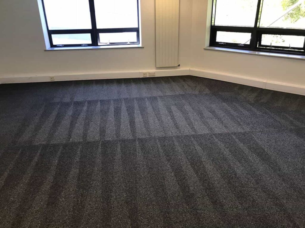 This is a photo of Penge Carpet Cleaning grey office carpet that has just been professionally steam cleaned.